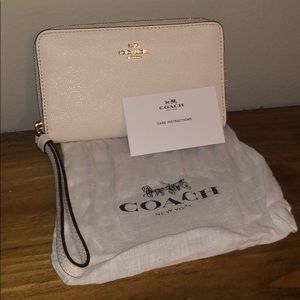 Coach wristlet wallet.